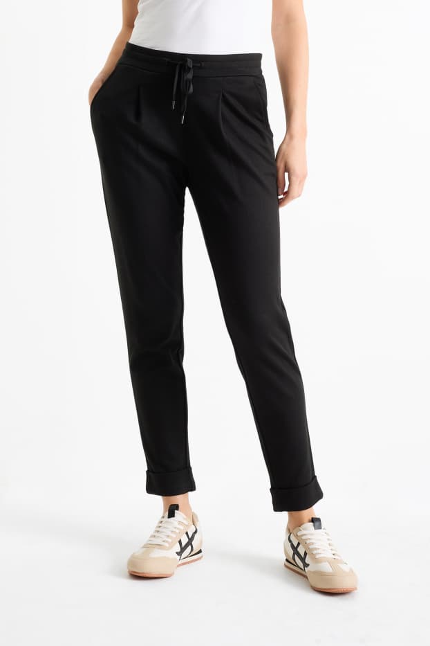 Donna - Pantaloni di jersey - vita media - tapered fit - nero