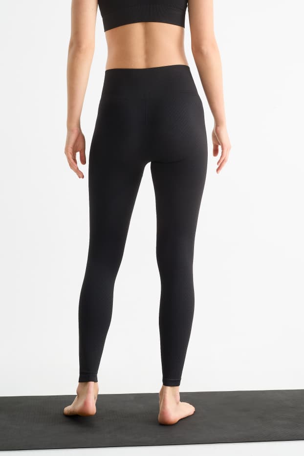 Donna - Leggings tecnici - senza cuciture - tramati - protezione UV - nero