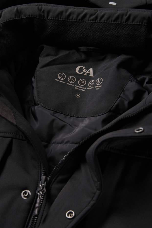Hommes - Veste softshell à capuche - 4 Way Stretch - déperlante - noir