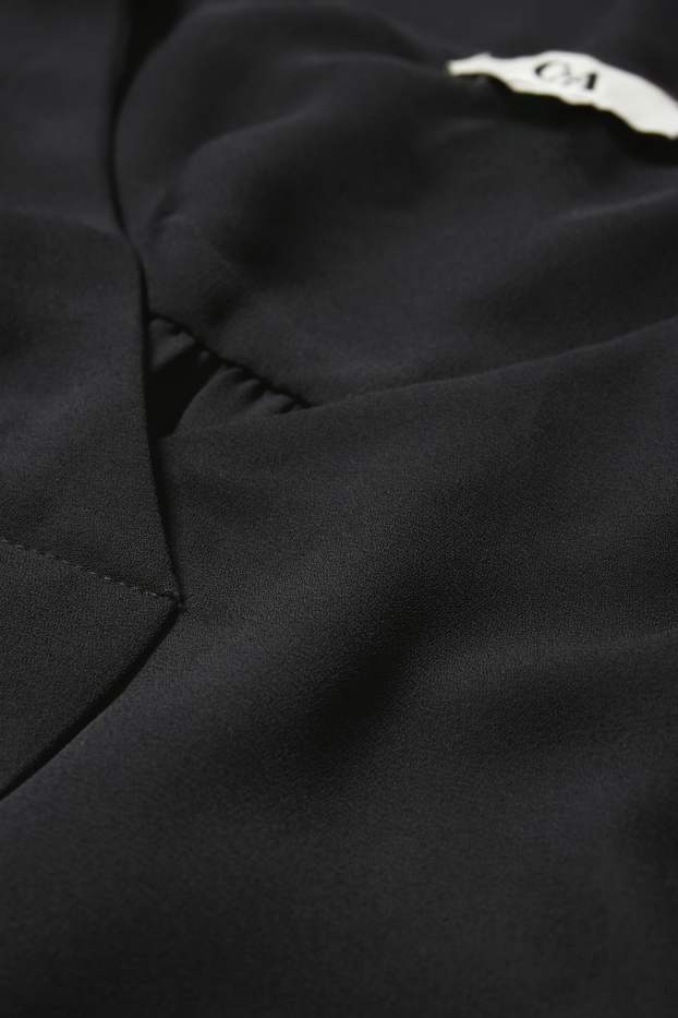 Damen - Bluse mit V-Ausschnitt - schwarz