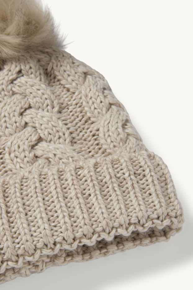 Dames - Muts met pompon - kabelpatroon - licht beige