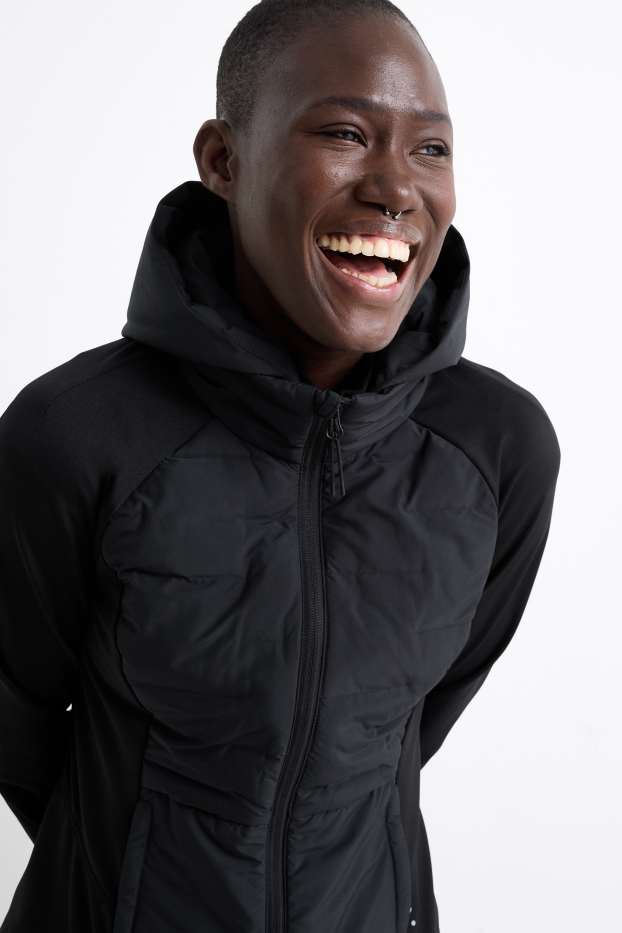 Femmes - Veste chaude de sport à capuche - noir