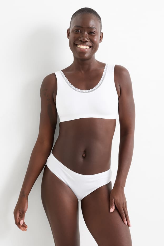 Dámské - Sportovní podprsenka - bezešvá - bílá