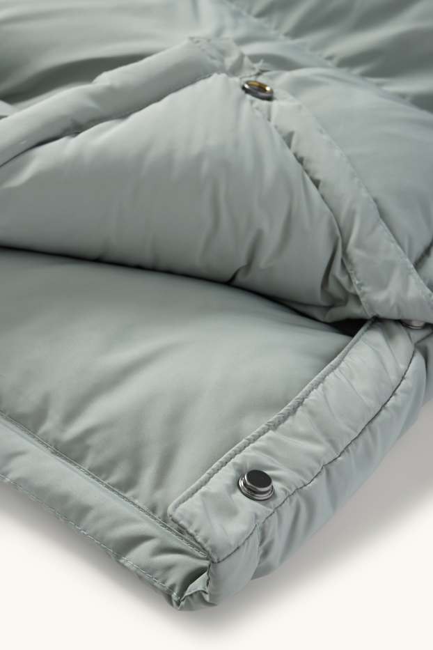 Women - Quilted coat with hood - light green