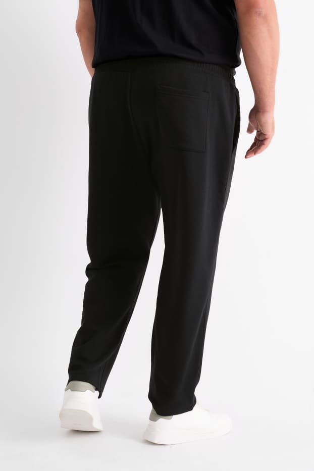 Bărbați - Pantaloni de trening - negru