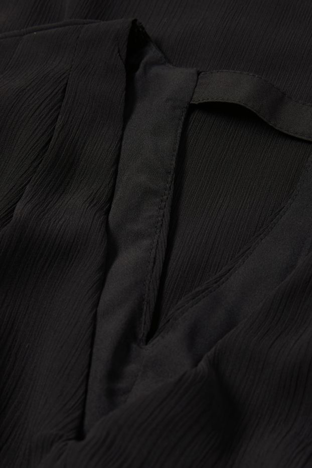 Women - V-neck chiffon dress - textured - black