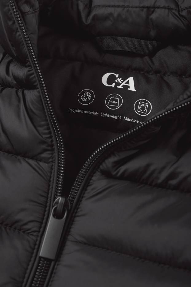 Women - Quilted gilet - black