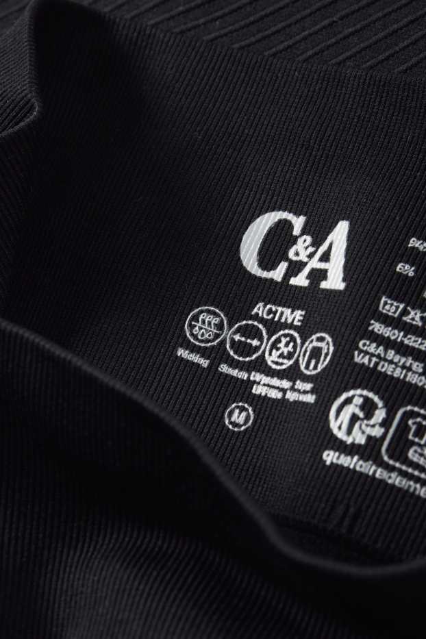 Donna - Leggings tecnici - senza cuciture - tramati - protezione UV - nero