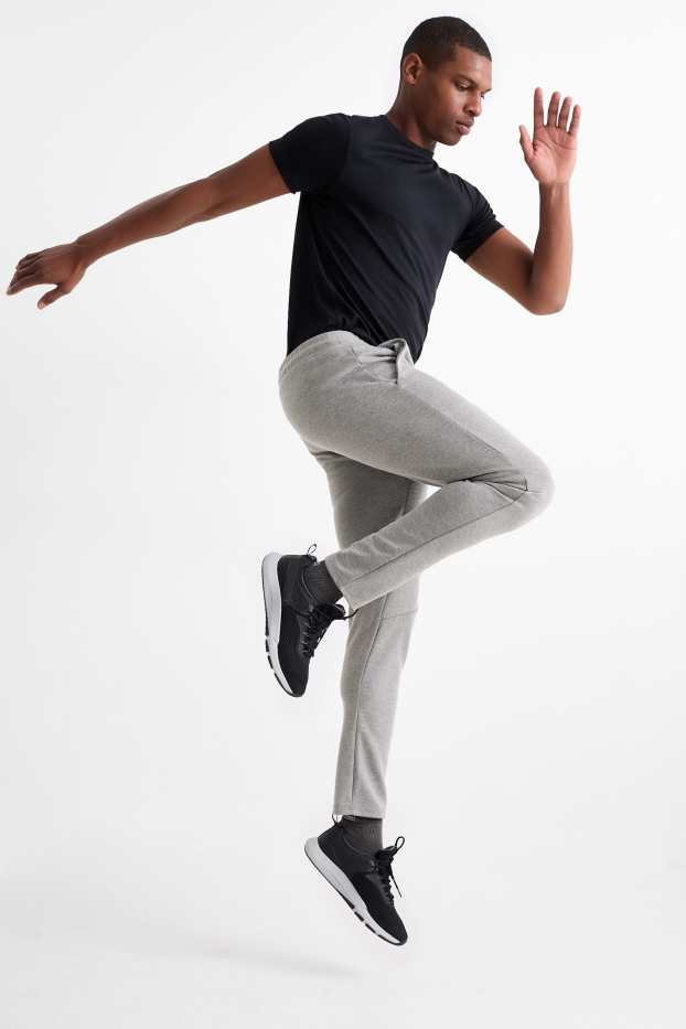 Home - Pantalons de xandall - gris clar jaspiat