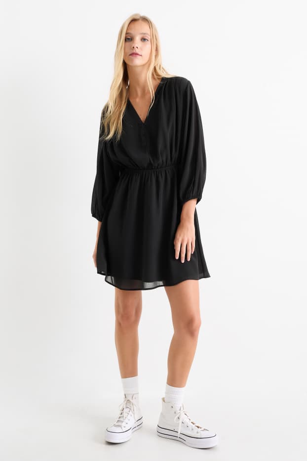 Women - V-neck chiffon dress - textured - black