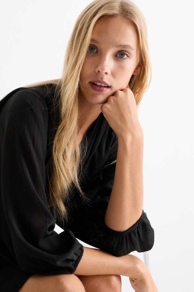 Women - V-neck chiffon dress - textured - black