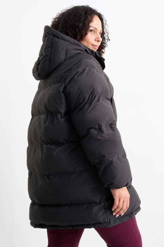 Dona - Jaqueta embuatada amb caputxa - resistent a l’aigua - negre