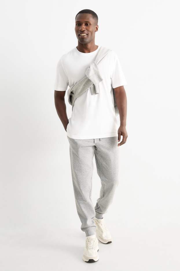 Bărbați - Pantaloni de trening - gri deschis melanj