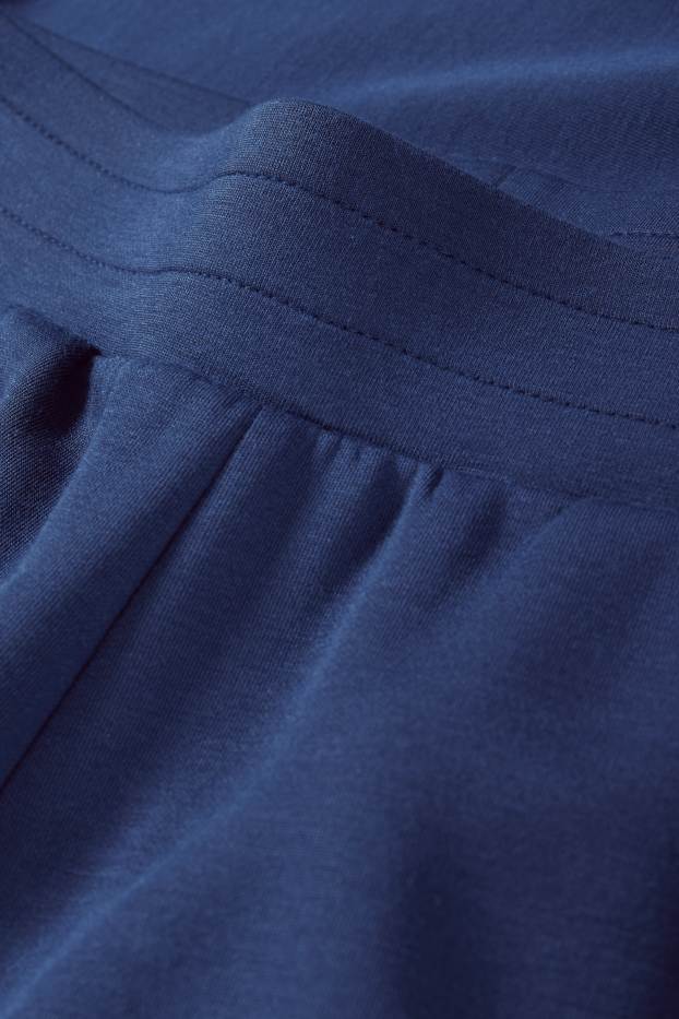 Dona - Pantalons de xandall  - blau fosc