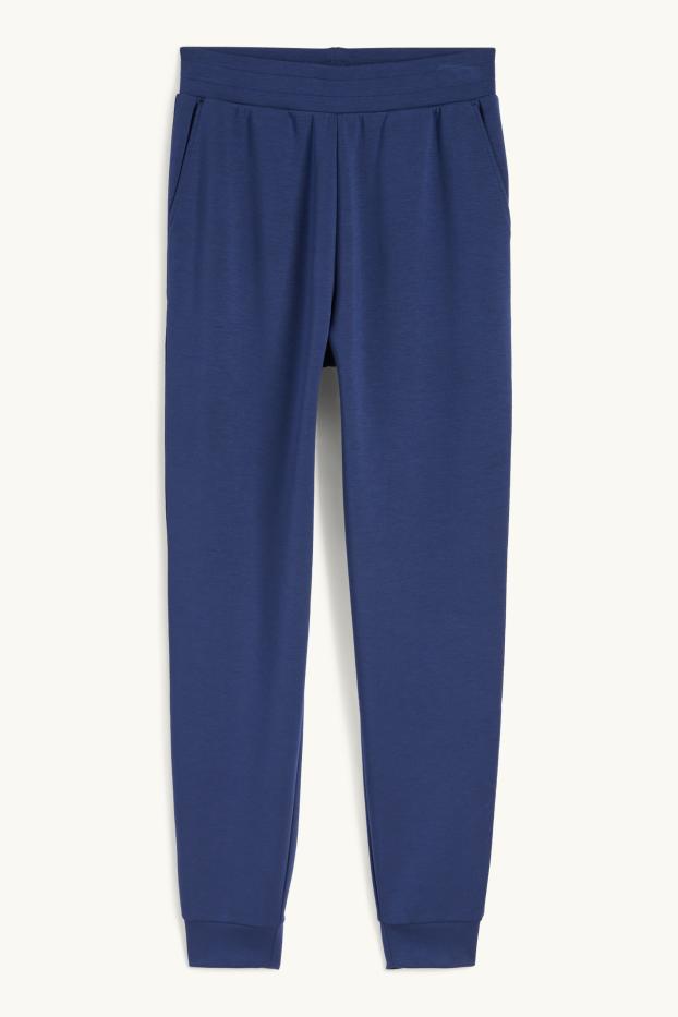 Dona - Pantalons de xandall  - blau fosc
