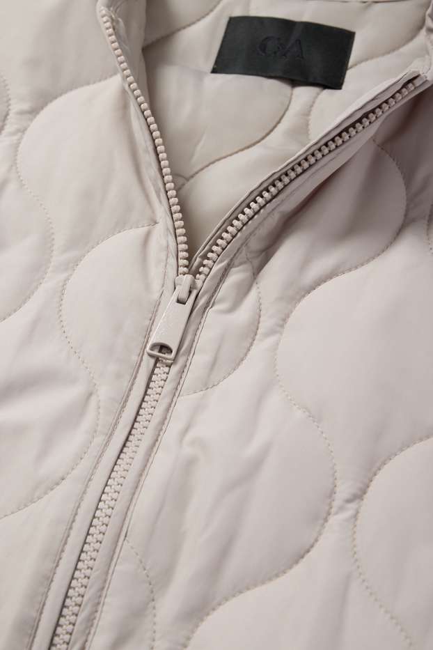 Women - Quilted jacket - light beige