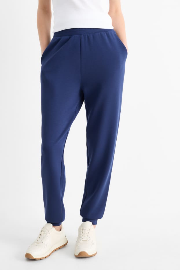 Dona - Pantalons de xandall  - blau fosc