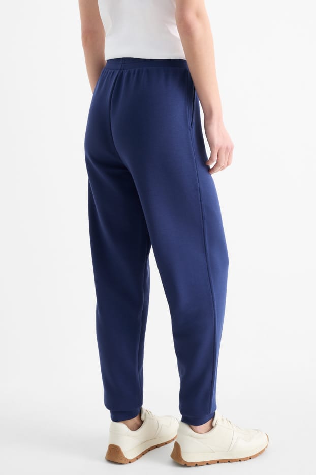 Dona - Pantalons de xandall  - blau fosc