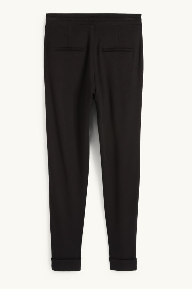 Donna - Pantaloni di jersey - vita media - tapered fit - nero