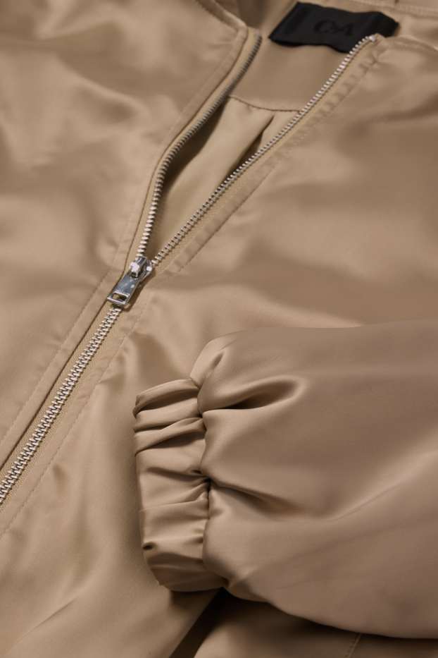 Women - Satin bomber jacket - gold