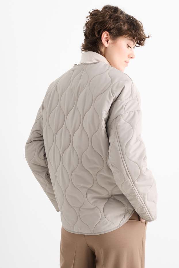 Women - Quilted jacket - light beige