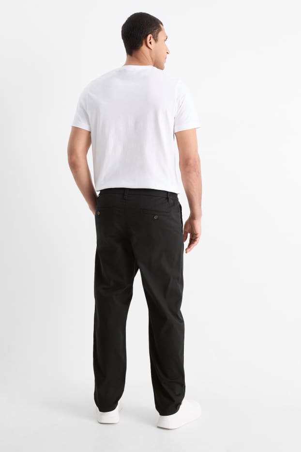 Pánské - Kalhoty chino - tapered fit - černá