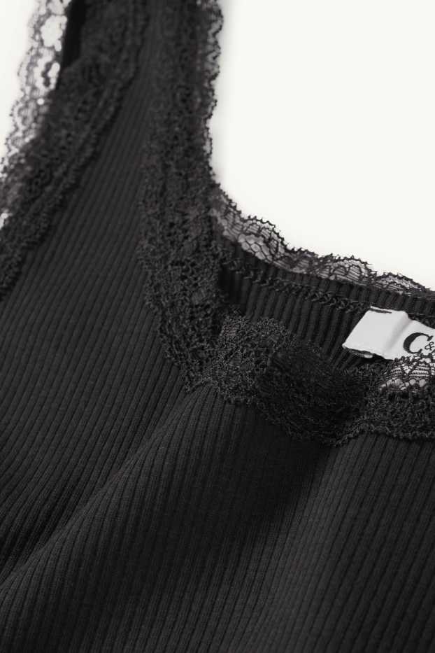 Dona - Samarreta sense mànigues crop - de canalé - negre