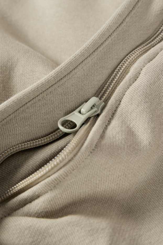 Home - Dessuadora oberta oversized amb caputxa - verd