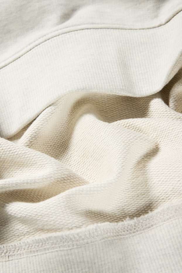 Home - Dessuadora amb caputxa - gris clar jaspiat