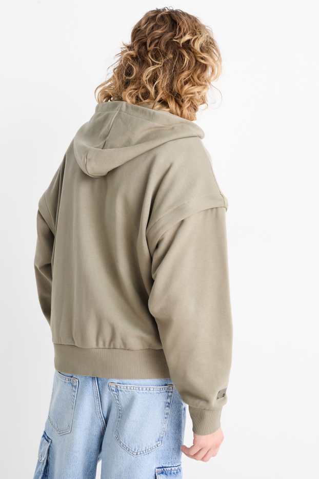 Home - Dessuadora oberta oversized amb caputxa - verd