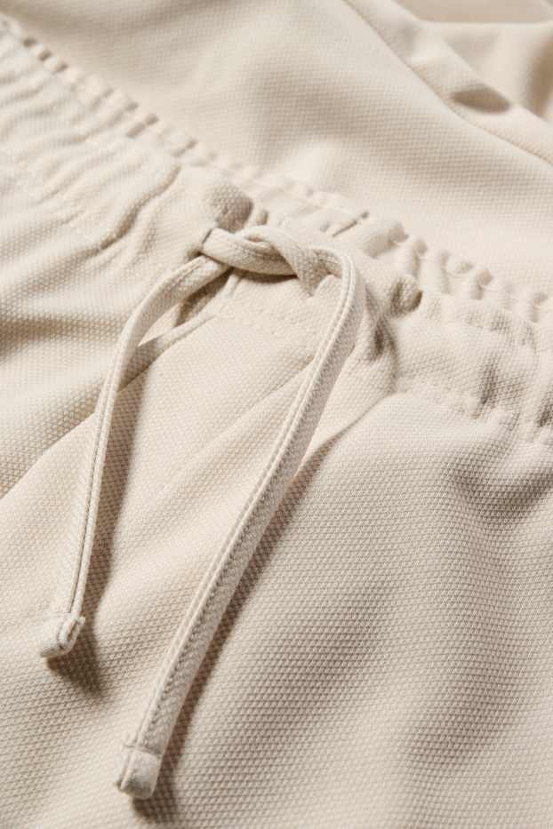 Bărbați - Pantaloni de trening - structurați - bej deschis