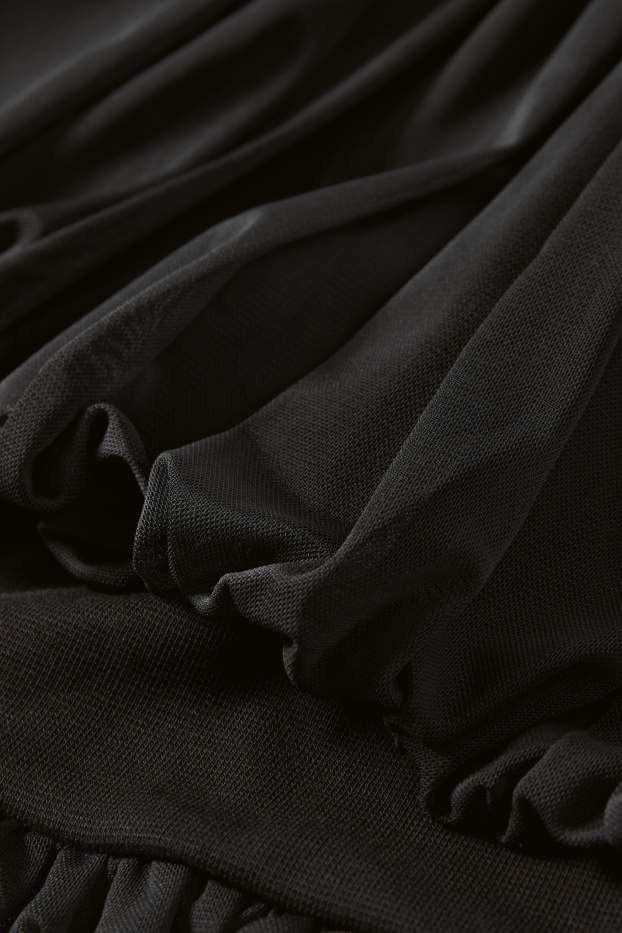 Dona - Faldilla - negre