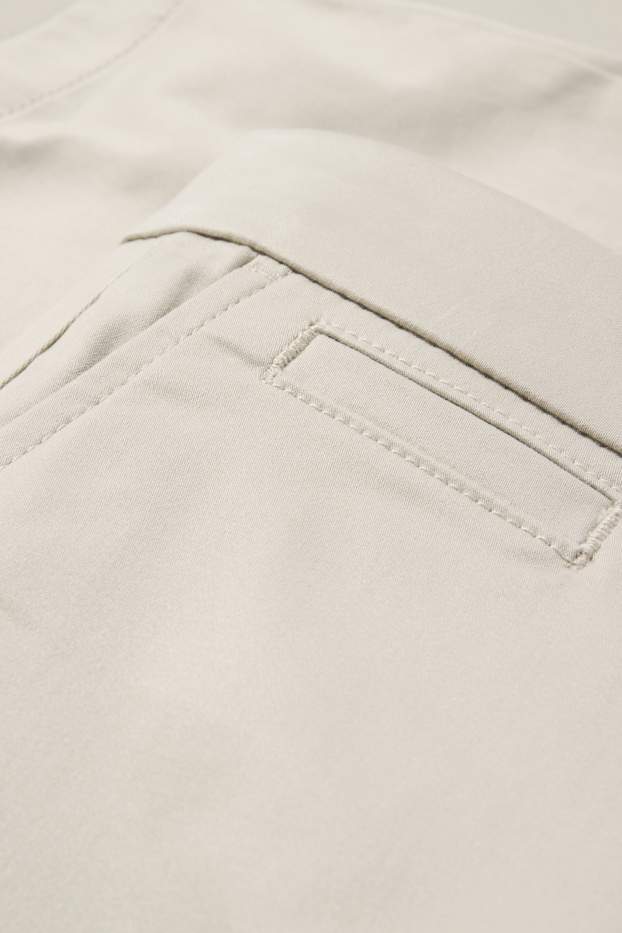 Femei - Chino - talie medie - tapered fit - bej