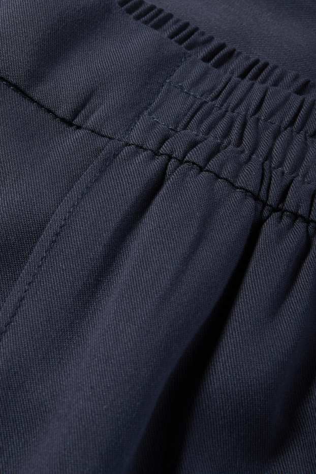 Dona - Pantalons de tela - high waist - tapered fit - blau fosc