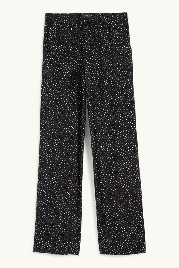 Femmes - Pantalon en toile - high waist - jambe évasée - à pois - noir
