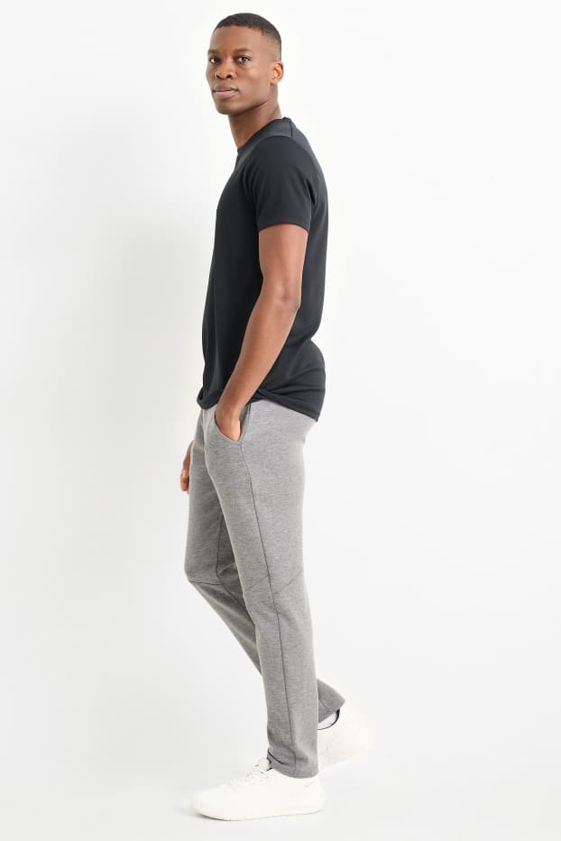 Uomo - Pantaloni sportivi tecnici - grigio chiaro
