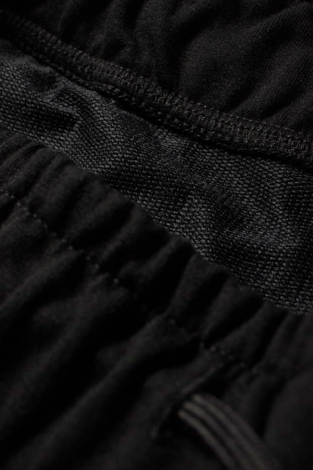 Uomo - Pantaloni sportivi tecnici - nero
