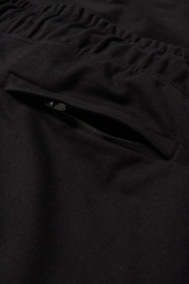 Uomo - Pantaloni sportivi tecnici - nero