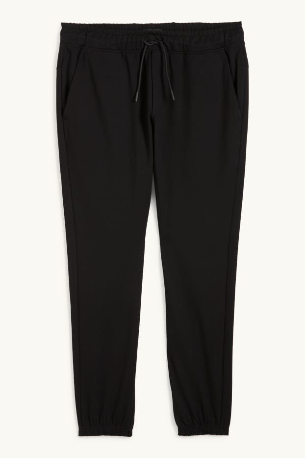 Uomo - Pantaloni sportivi tecnici - nero