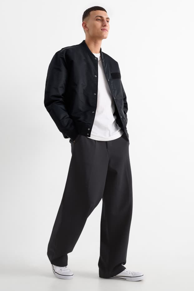 Bărbați - Pantaloni de trening - negru