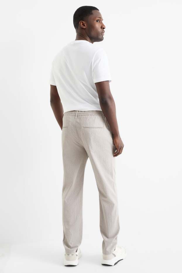 Pánské - Kalhoty chino - tapered fit - strukturované - béžová