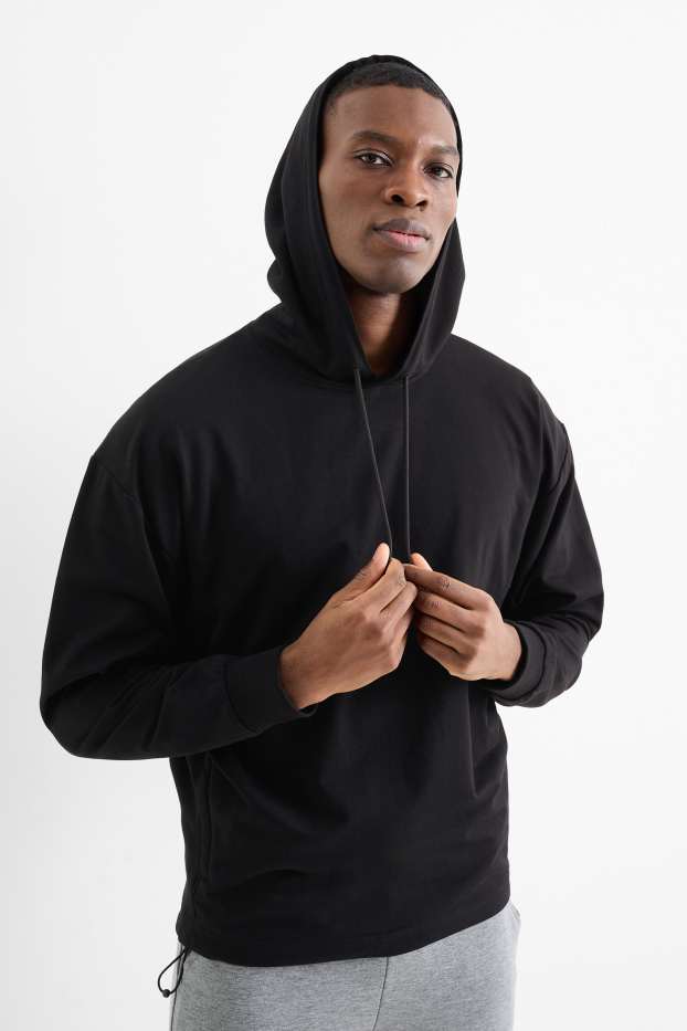 Heren - Oversized sporthoodie - zwart