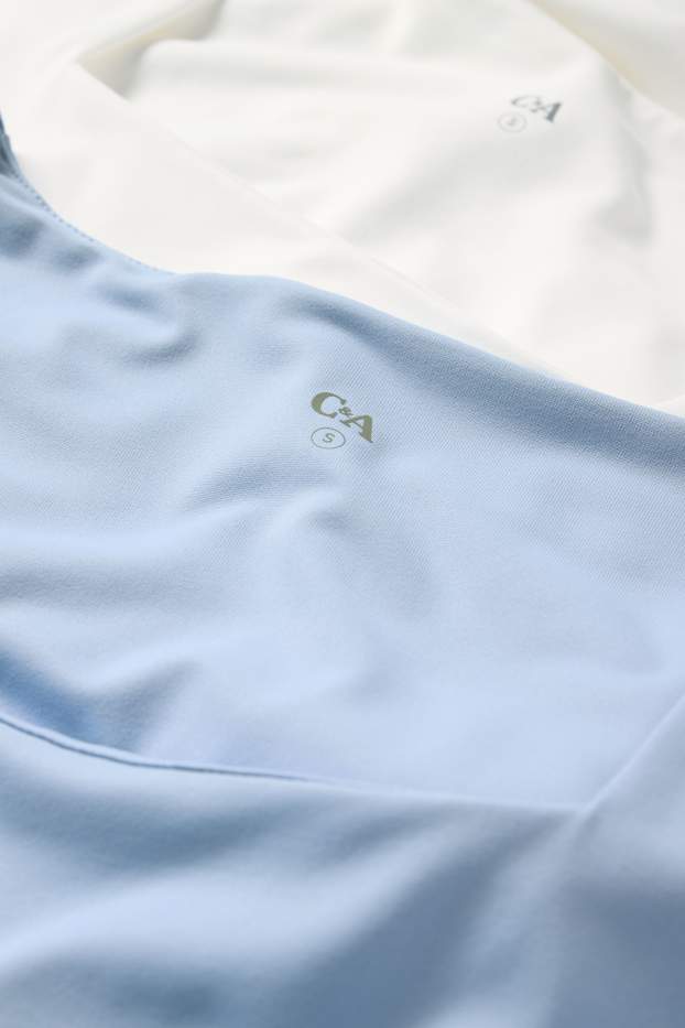 Femmes - Lot de 2 - hauts - blanc / bleu clair