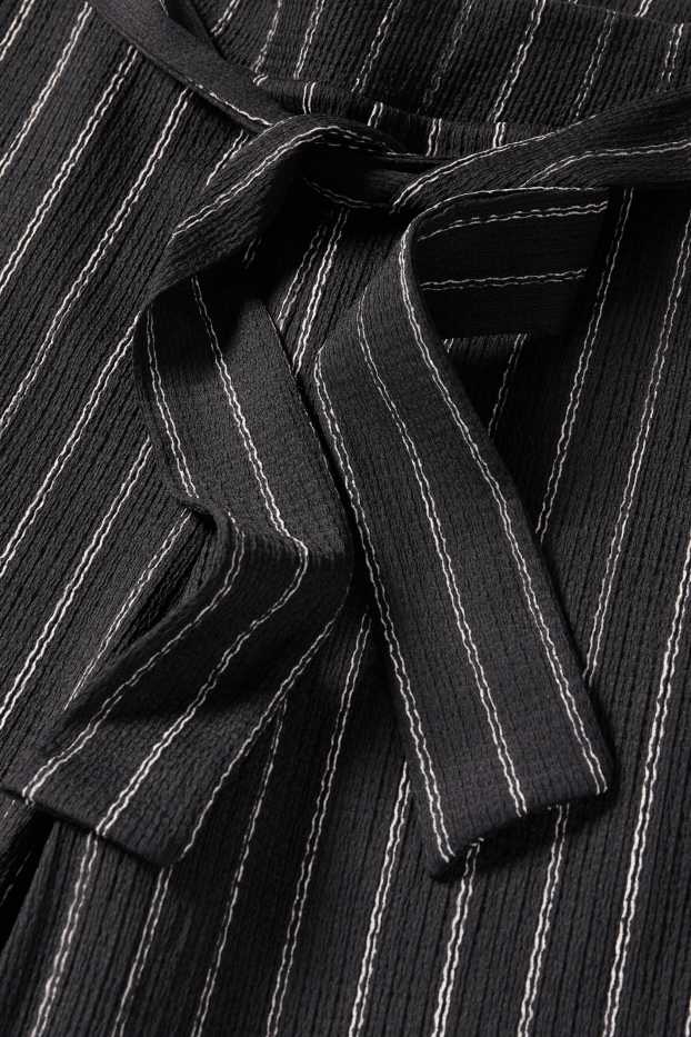 Women - Jersey trousers - mid-rise waist - wide leg - striped - textures - black