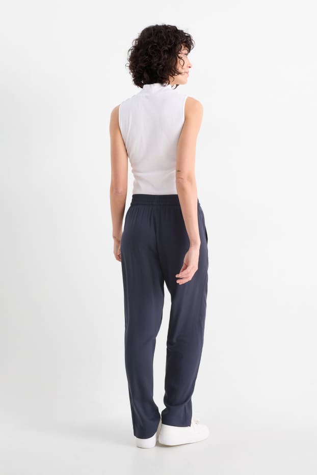 Dona - Pantalons de tela - high waist - tapered fit - blau fosc