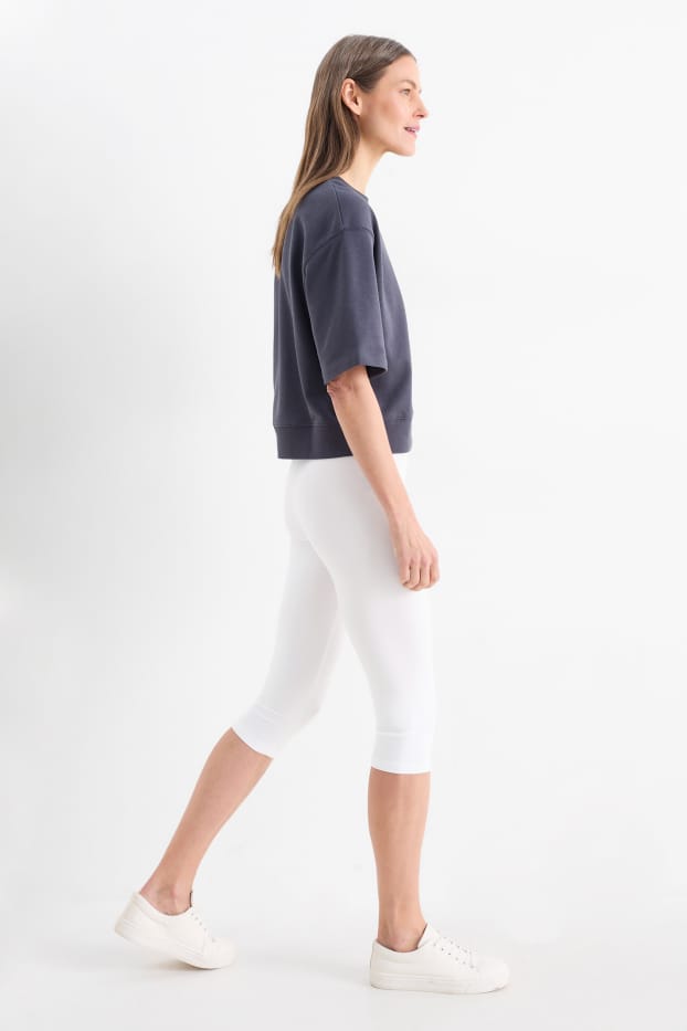 Dames - Set van 2 - basic capri-legging - zwart / wit