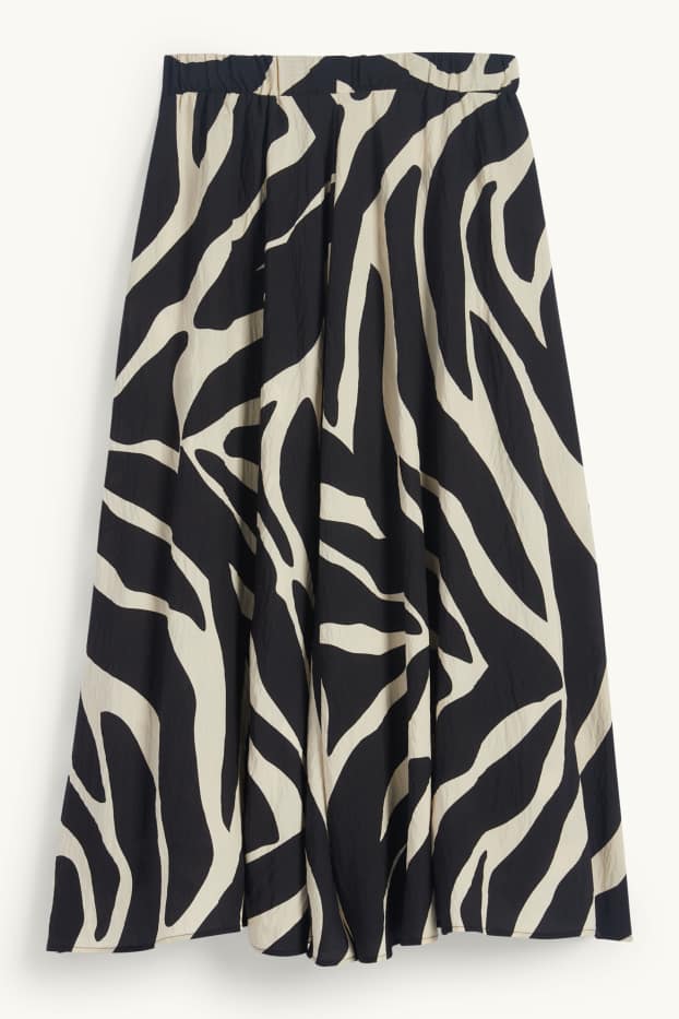 Dona - Faldilla - estampada - negre/beix