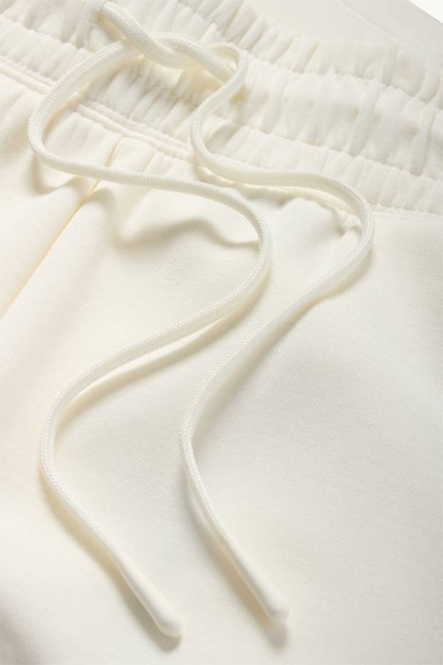 Dona - Pantalons curts tècnics - beix clar