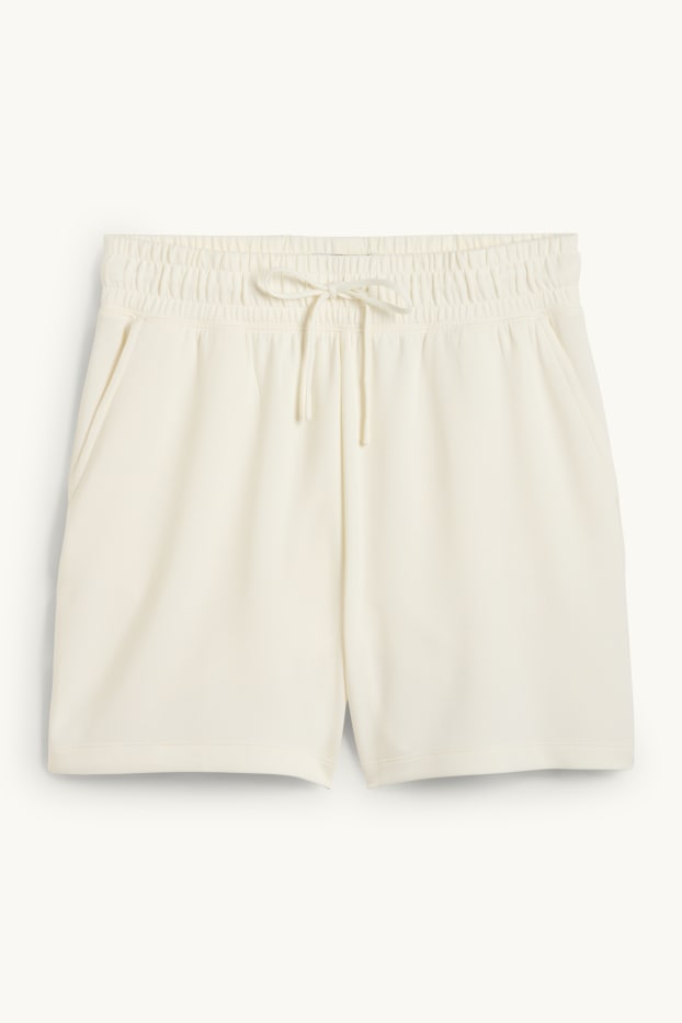 Dona - Pantalons curts tècnics - beix clar