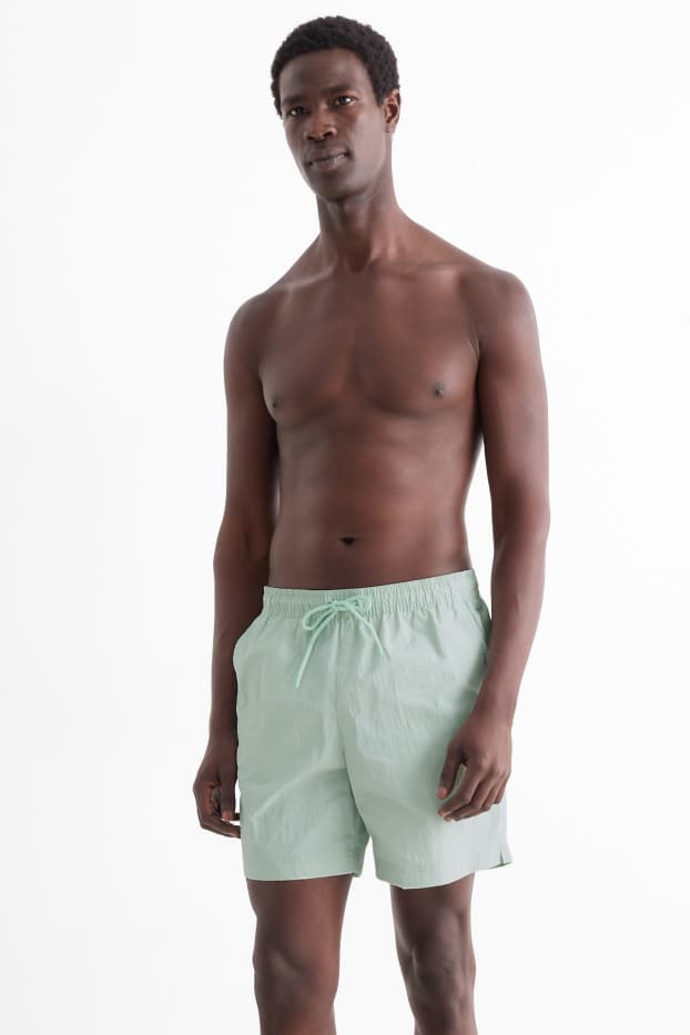 Men - Swim shorts - mint green